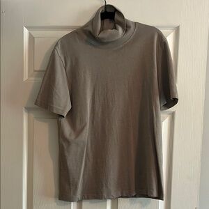 Women’s Classic Tan Turtleneck Shirt

P2P 18 in, length 25 in